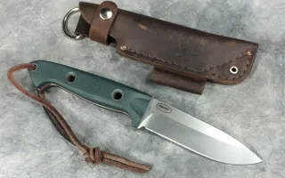 Benchmade Bushcrafter 162 fixed blade knife with micarta handles tilted at an angle on a texture background.